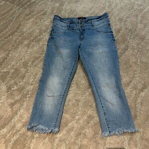 Refuge jeans.  Size 10. Fringed bottoms.